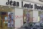Antisémitismes: Tags antisémites sur une devanture d'un coiffeur à Bourgoin Jallieu - © Europe-Israel