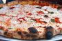 Les pizzas motivent plus les salariés que les primes - © Slate .fr