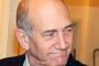 Olmert: Israël va réagir de façon "disproportionnée" aux roquettes - © DHNet.be